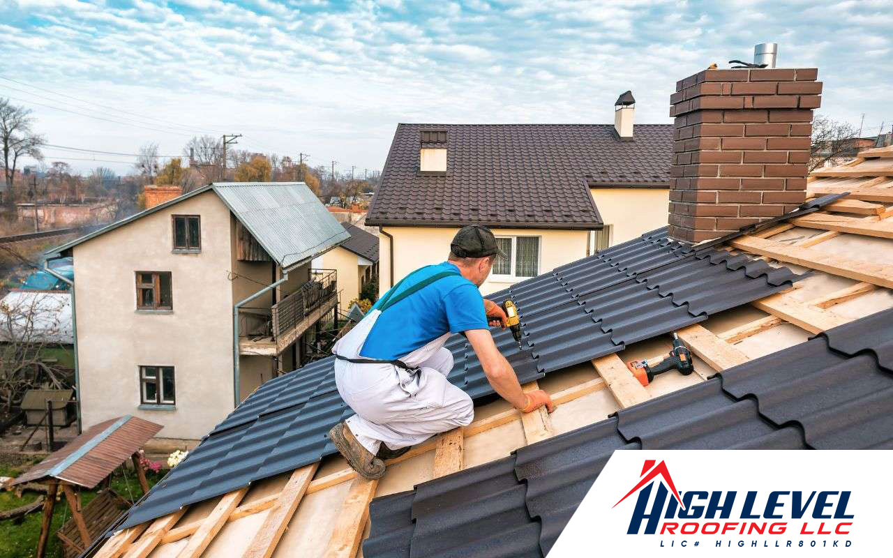 Professional roofer repairing a damaged roof.